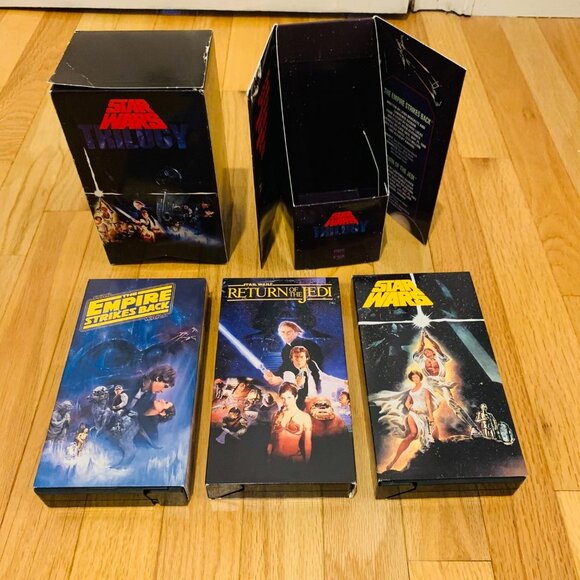 Star Wars Trilogy Vintage add 3-Tape Set (VHS,1995) in 3 Case Binder - Picture 1 of 6